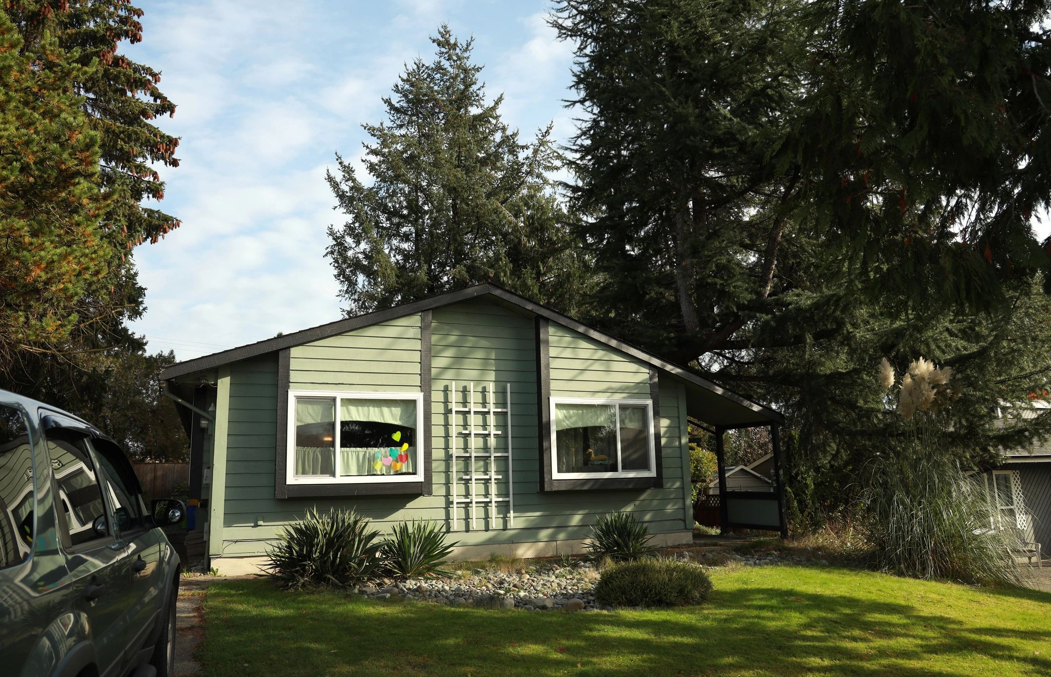 Single-story home exterior with front lawn