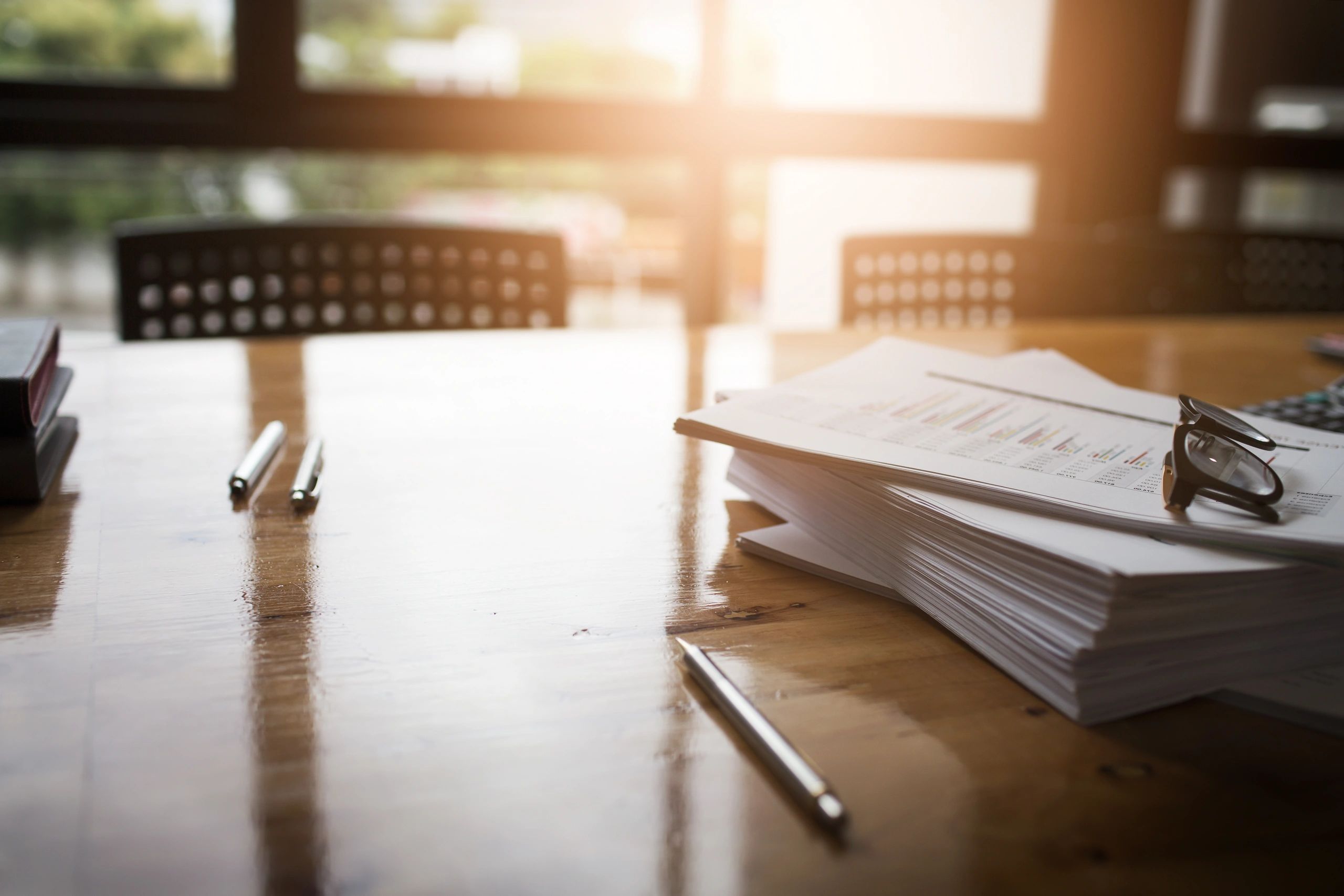 Documents and pen on a desk